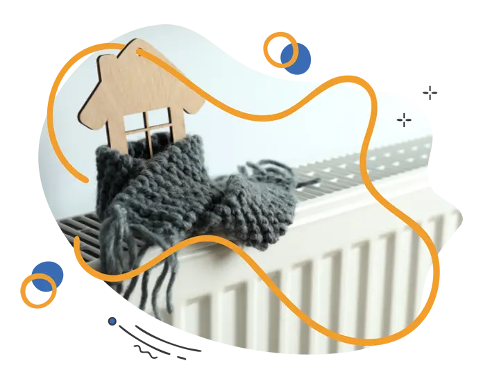 Wooden house model and grey knitted scarf on a white radiator, symbolising warmth and comfort in energy-efficient homes.